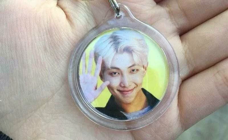 Fans crack up after RM's smirking face is found in a Wanna One keychain vending machine - Binge Post